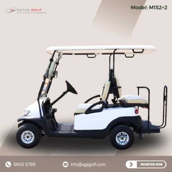 4 seater white electric golf cart, manufactured by Qatar Golf International.