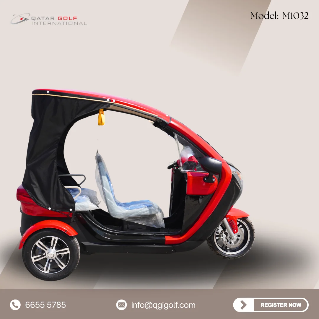 black and red 2-seater electric golf cart, Model M1032, manufactured by Qatar Golf International.